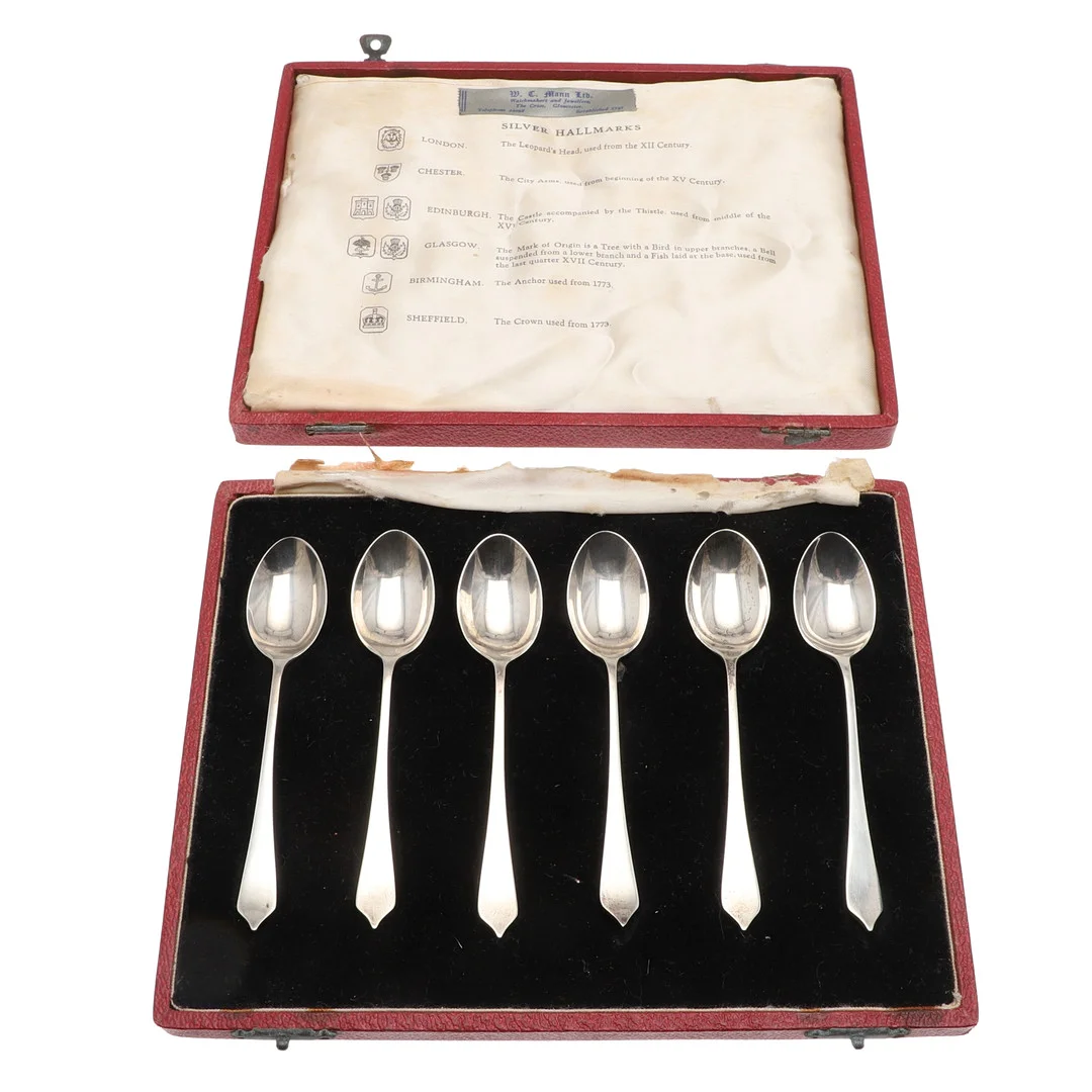 A CASED SET OF SIX "SILVER HALLMARKS" SILVER TEASPOONS. — Silver — Lawrences Auctioneers