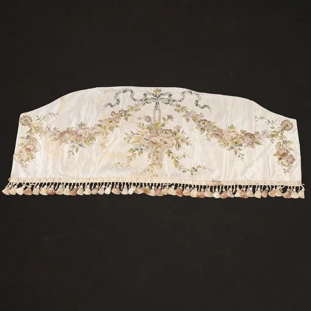 A LATE GEORGIAN SILK NEEDLEWORK FLORAL PANEL.