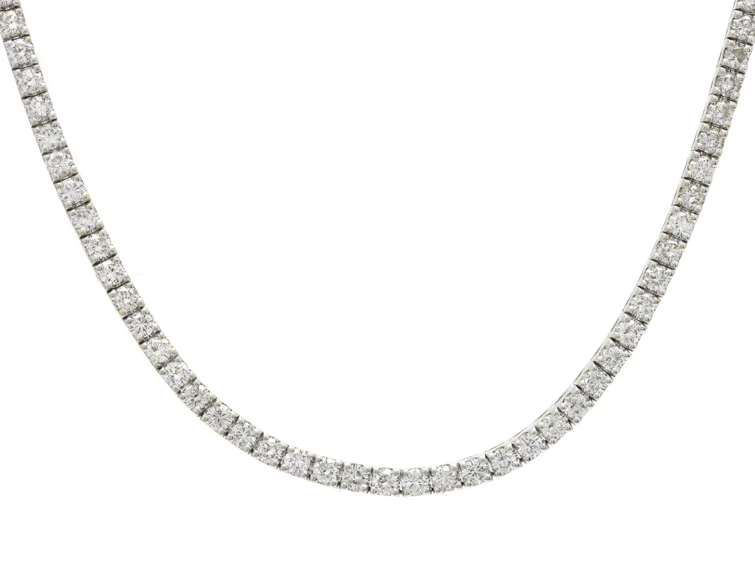 RIVIERECOLLIER, 18K vitguld, 124 briljantslipade diamanter ca 13,30 ctv, ca TCr-Cr/SI-P, några stenar ca TW, längd 42 cm, vikt 38,2 g. — Smycken/Collier — Kaplans
