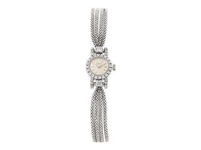 PIAGET, damur, 15,5 mm, Cal 6P, Boett nr. 6861 / 44, 18K vitguld, manuell, plexiglas, briljanter / diamanter på boett (34 st. TW-W/VS, ca 0,80 ctv, 1 st. skadad), länk i 18K vitguld (ej original), längd 165 mm, totalvikt 26,5 gram, ca 1960.