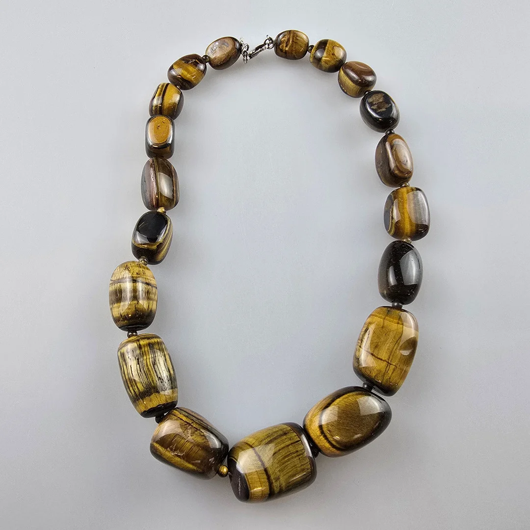 - Massive TIGERAUGE-KETTE - L. ca.51cm, Gewicht ca. 223g. — Necklace — Auktionshaus Blank