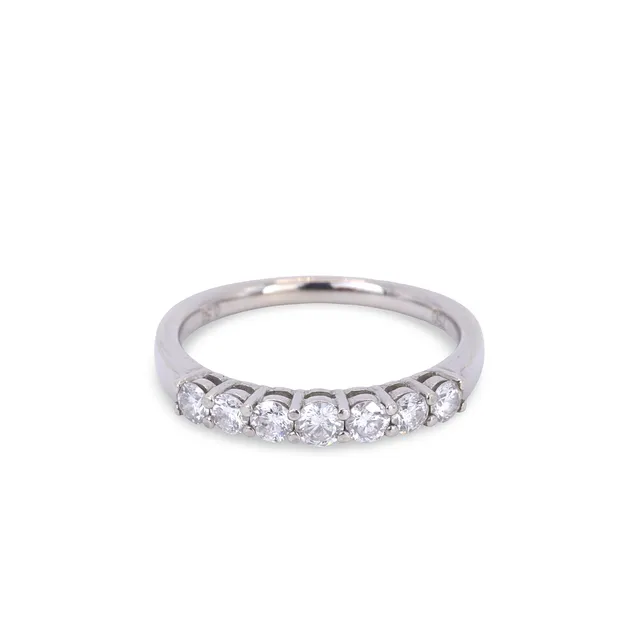 18CT GOLD DIAMOND HALF ETERNITY RING.