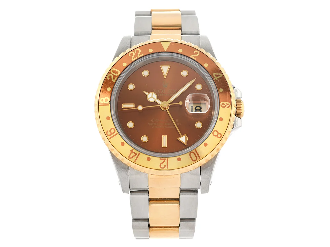 ROLEX, Oyster Perpetual Date, GMT-Master II (Swiss-T<25), Chronometer, s.k. "Root Beer", Ref nr. 16713, Serie nr. U428307, Cal 3185, Verk nr. 3 8023308, Boett nr. 16710, herrur, 40 mm, stål/guld, automatisk, safirglas (nagg), 24-timmarsvisning, (Luminova Dial / Tritium Hands), Oysterlocklänk, viklås, Ref nr. 78793-U2/401 B, cert, oktober 1998, box, ytterkartong. — Klockor/Rolex — Kaplans