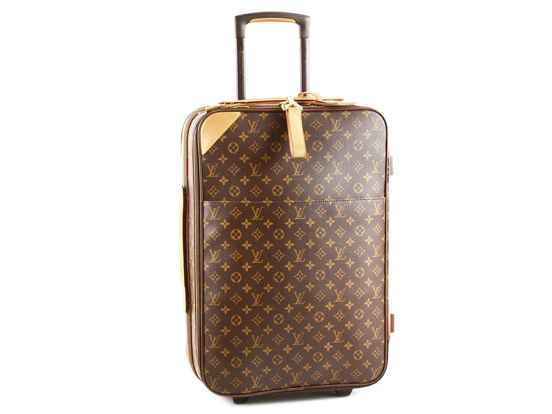 RESVÄSKA, LOUIS VUITTON, Pegase 55, monogram canvas, 55x37x20cm, lås med nyckel, adresstagg, en spricka vid gummit, kan lagas hos Louis Vuitton. — Accessoarer/Väskor — Kaplans