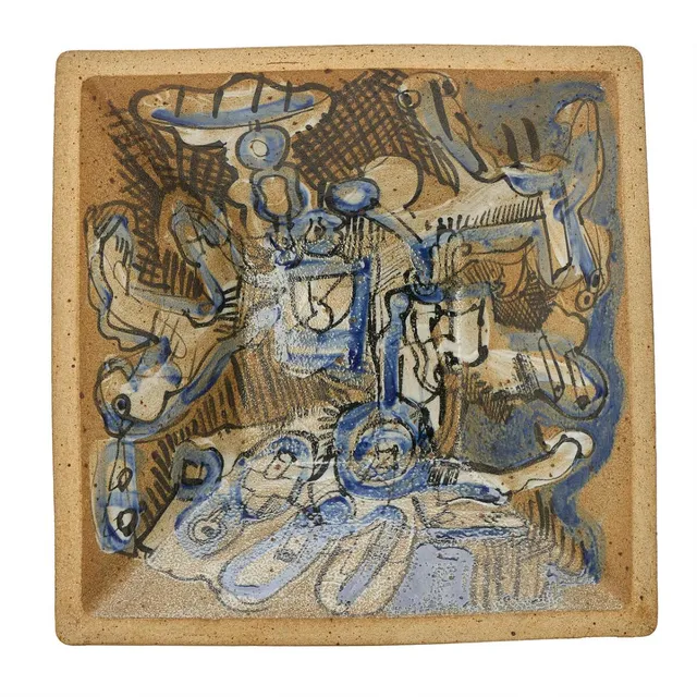 Four-sided stoneware wall dish with slanted sides. Decorated with figurative motifs in dark brown, blue and white glaze. Signed STEN. Manufactured by Bing & Grøndahl. Unique. Metal wall mounting is fitted to the reverse. H. 10.7–12 cm. W./L. 45 cm.