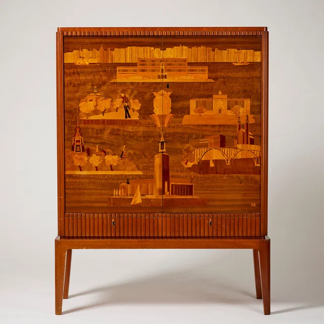 BIRGER EKMAN. Praktskåp, "Stockholm 2", Mjölby Intarsia, sålt av AB Harry B. Carlsson 1944.