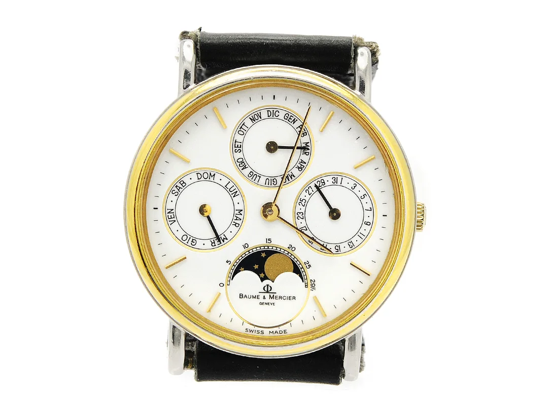 BAUME & MERCIER, herrur, 31,5 mm, Cal 11522, Boett nr. 5133 / 1560804, bicolour, quartz, safirglas, dag, datum, månad, månfas, skadad urtavla, läderband, cert (ej komplett), ca juli 1989, box. — Klockor/Baume&Mer — Kaplans