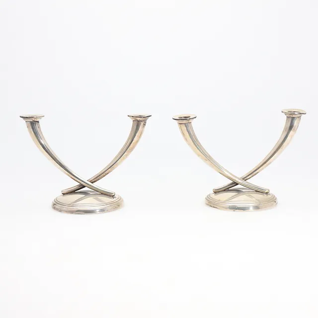 Pair of silver candelabra, 20th Century.