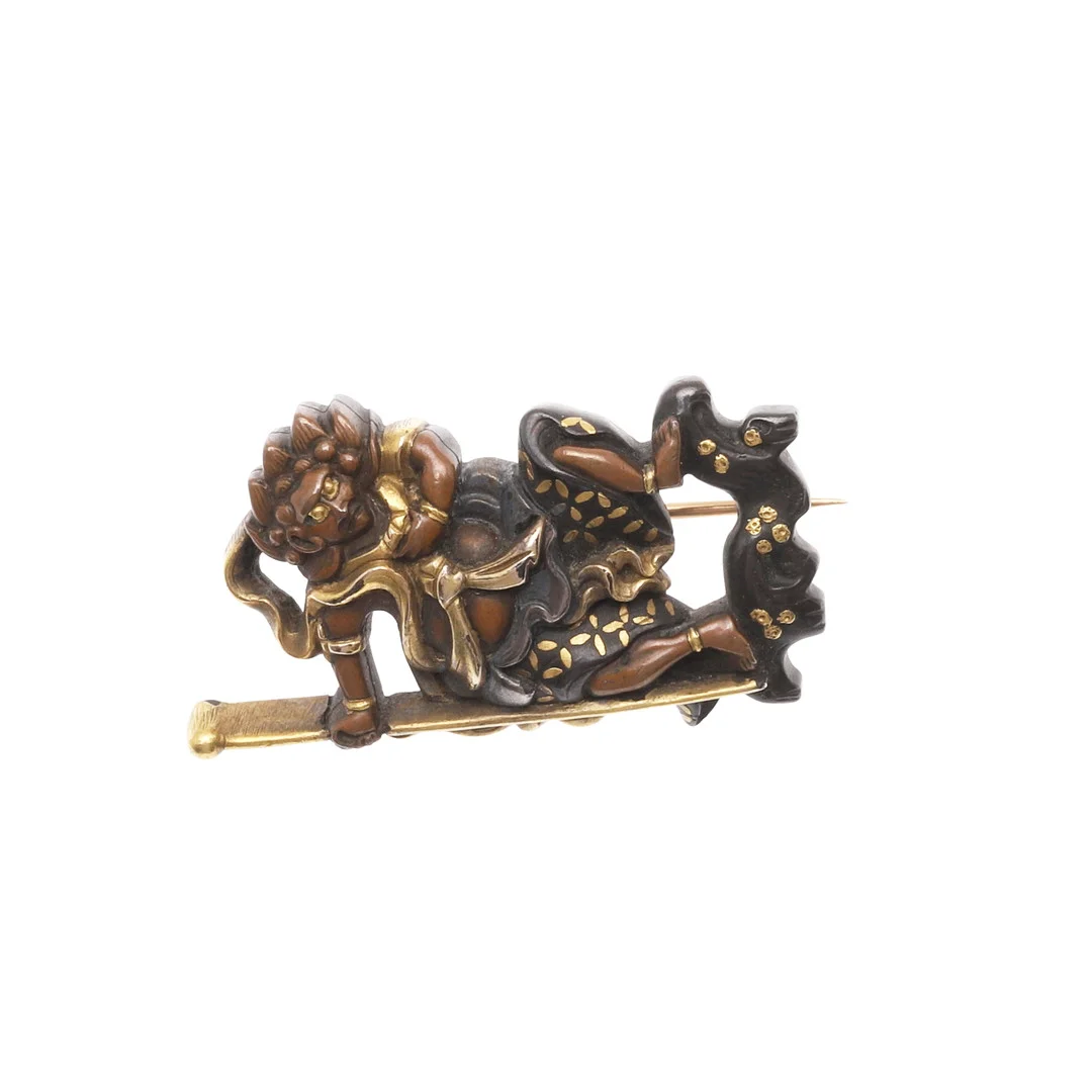 A SHAKUDO BROOCH. — Brooches & Pendants — Lawrences Auctioneers