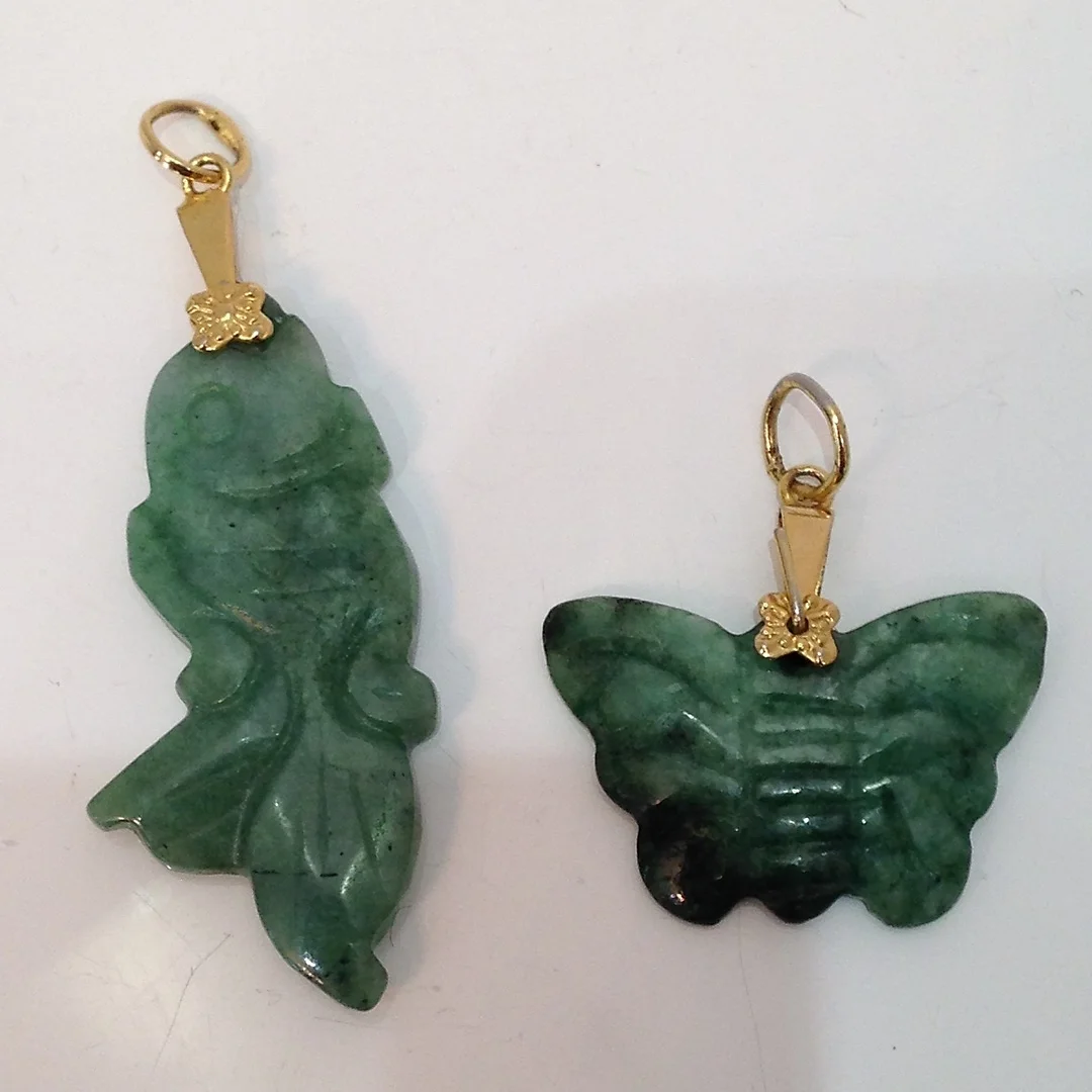 TWO JADE PENDANTS. — Brooches & Pendants — Rumsey’s Auctioneers