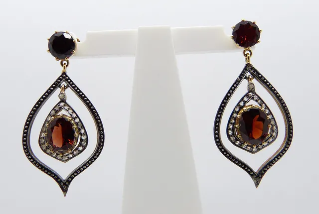 GARNET & DIAMOND EARRINGS, BOXED.