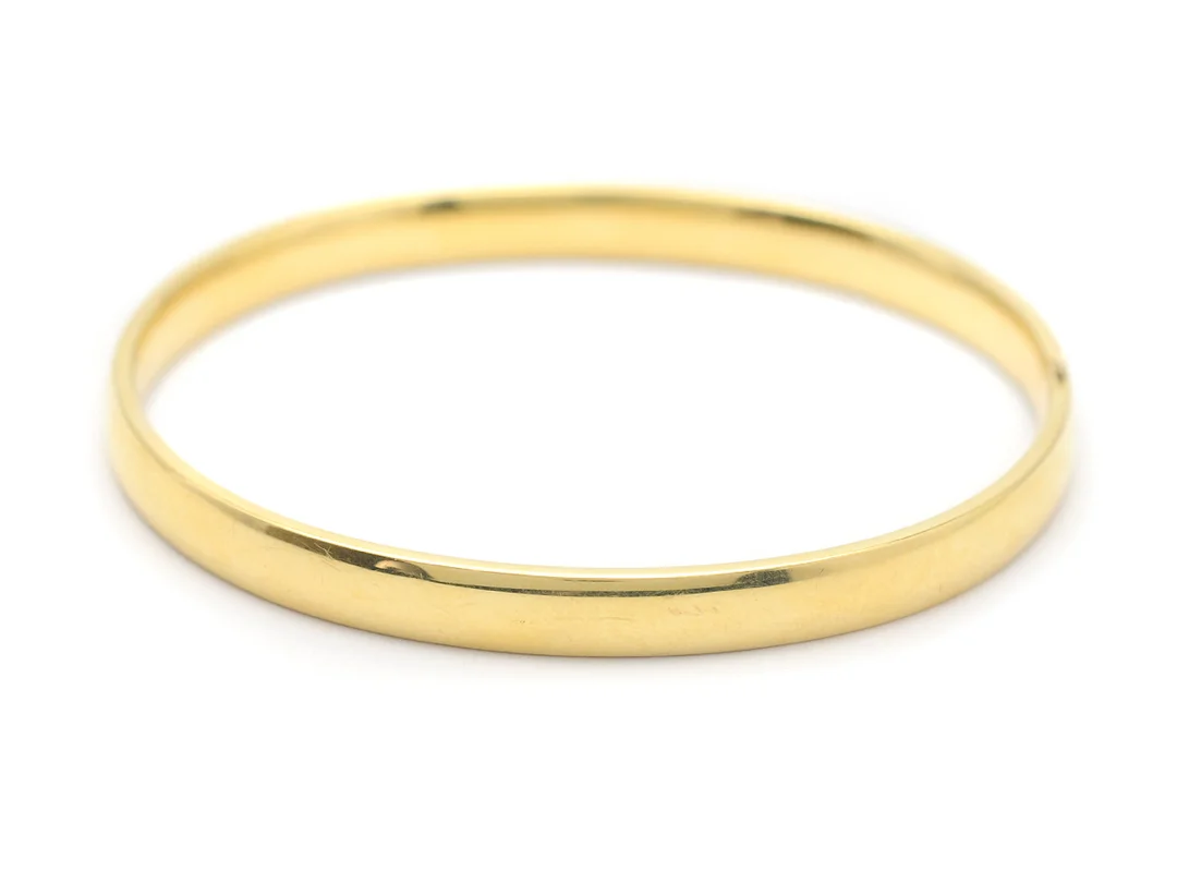 ARMRING, 18K guld, längd ca 18 cm, bredd ca 0,6 cm, vikt 11,1 g, öppningsbar. — Smycken/Armring — Kaplans