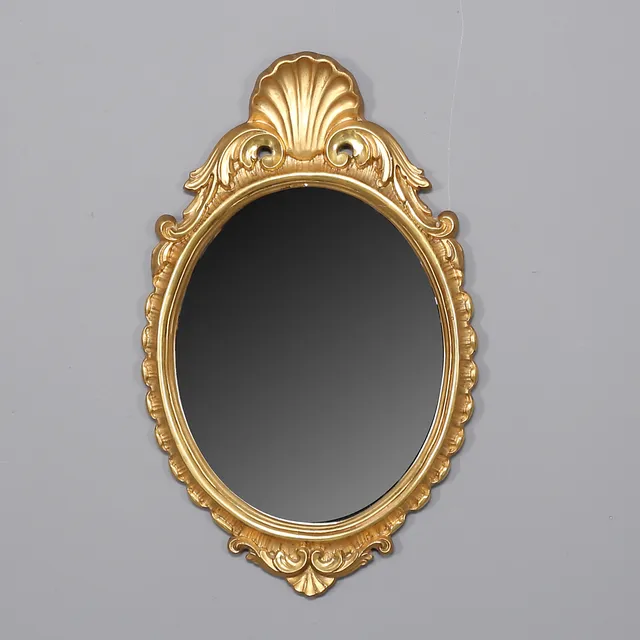 MIRROR, gilded and cut wood, rococo style, the second half of the 20th century.