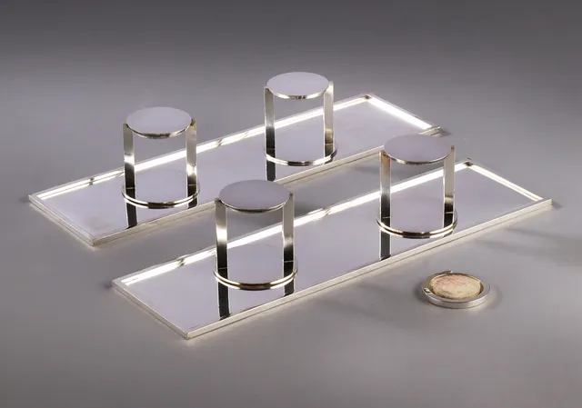 F. Hingelberg. A pair of sterling silver tealight candle trays and stands (8)