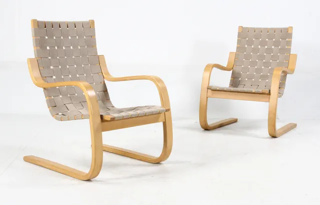 Alvar Aalto for Artek. Pair of cantilever / armchairs, model 406, birch (2)