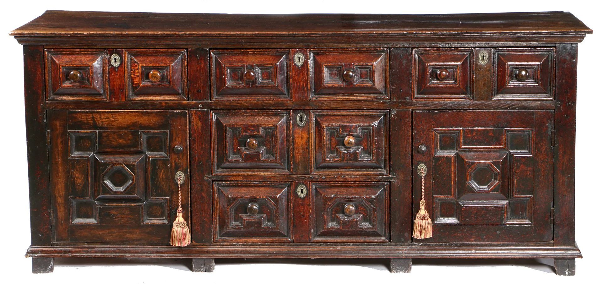 A LATE 17TH CENTURY OAK FULLY ENCLOSED GEOMETRIC DRESSER BASE, CIRCA 1680-1700. — Dining room furniture — Bishop & Miller