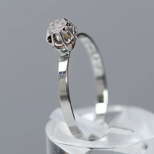 RING, 18K guld & 0,03ct diamant, storlek 17.5.