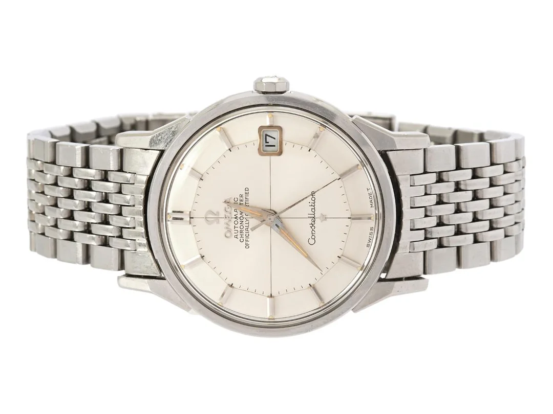 OMEGA, Constellation Calendar (Swiss Made T), Chronometer, s.k. "Pie-Pan", Cal 561, Serie nr. 24432488, Ref nr. ST 168.005, Boett nr. 168.005 (C.B), herrur, 34 mm, stål, automatisk, plexiglas, datum, originallänk, viklås, Ref nr. 1503/70, ca 1966. — Klockor/Omega — Kaplans