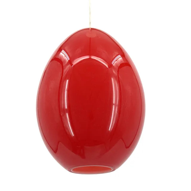 UNO KRISTIANSSON. Taklampa, "Unouvo", (ett ägg), rödtonat glas med vit insida, för Luxus, Vittsjö, 1900-talets andra hälft.