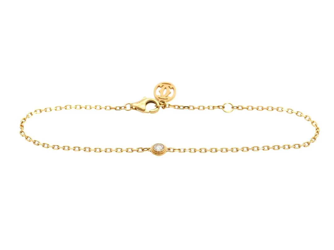 CARTIER, armband, d´Amore, 18K guld, briljantslipad diamant ca 0,09 ct, ca TW/VS, refnr. MLZ151, längd 16,5/18,5 cm, vikt 2,1 g, originaletui, ytterkartong. — Smycken/Armband — Kaplans