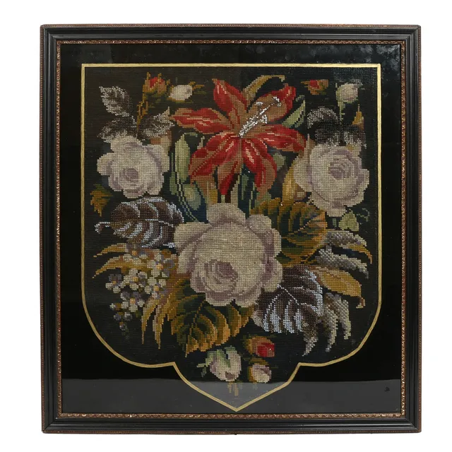 A 19TH CENTURY NEEDLEWORK SAMPLER.