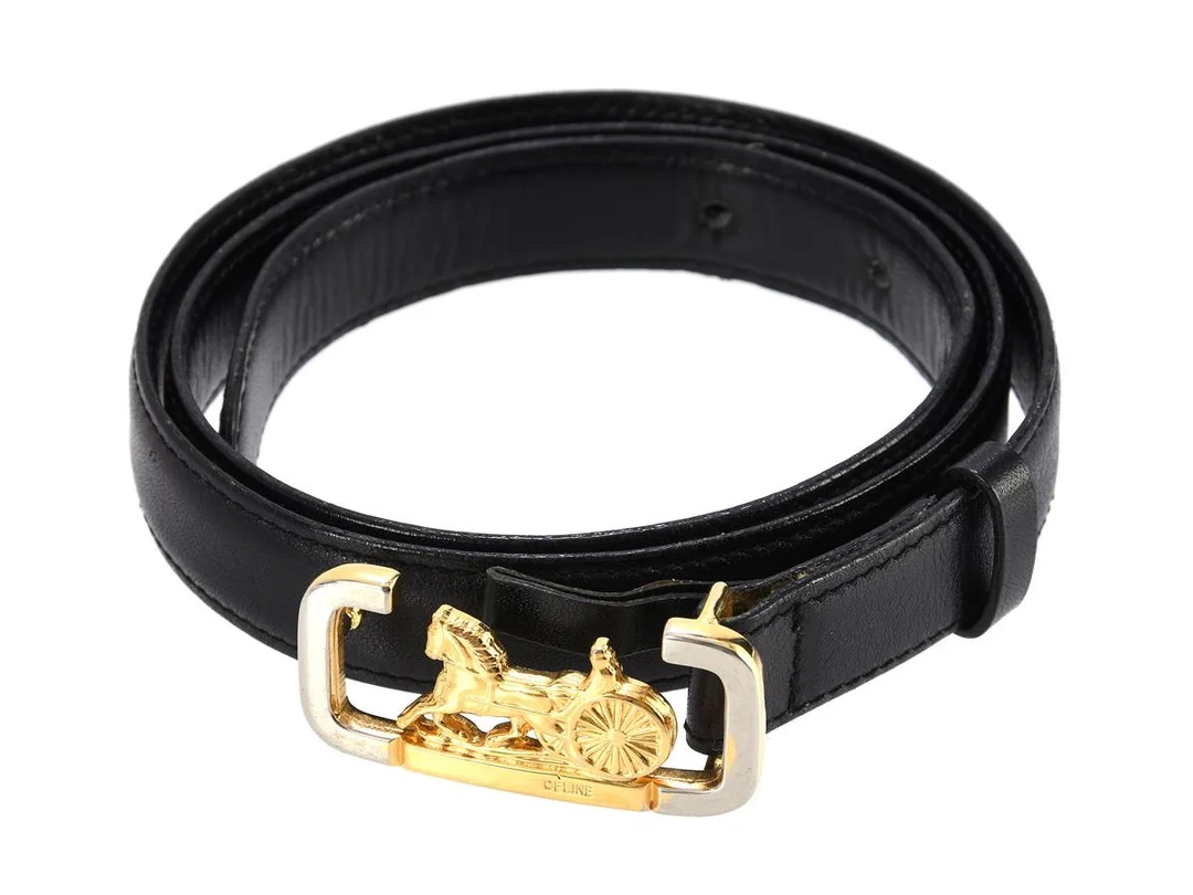 BÄLTE, CÉLINE, vintage, svart skinn, guldfärgat spänne, längd 75 cm, bredd 2cm. — Accessoarer/Bälten — Kaplans