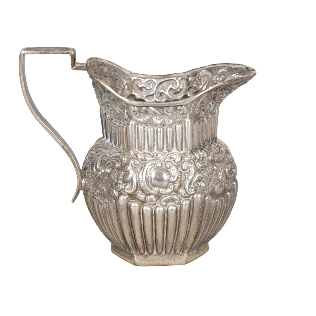 A LATE VICTORIAN SILVER CREAM JUG. — Silver — Bishop & Miller