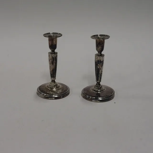 C.G HALLBERG. LJUSSTAKAR. ETT PAR, SILVER. 1955.