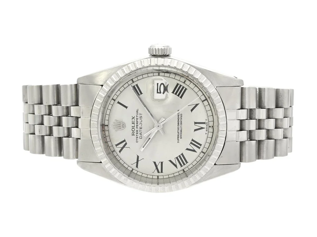 ROLEX, Oyster Perpetual, Datejust, Chronometer, s.k. "Buckley Dial", Ref nr. 1603, Serie nr. 3947161, Cal 1570, Verk nr. D704710, Boett nr. 1603, herrur, 36 mm, stål, automatisk, plexiglas, datum, skadad krona (se bild), skadad urtavla (lysmassa saknas), Jubileelänk, viklås, Ref nr. 62510H- 1.76/555, ca 1976. — Klockor/Rolex — Kaplans