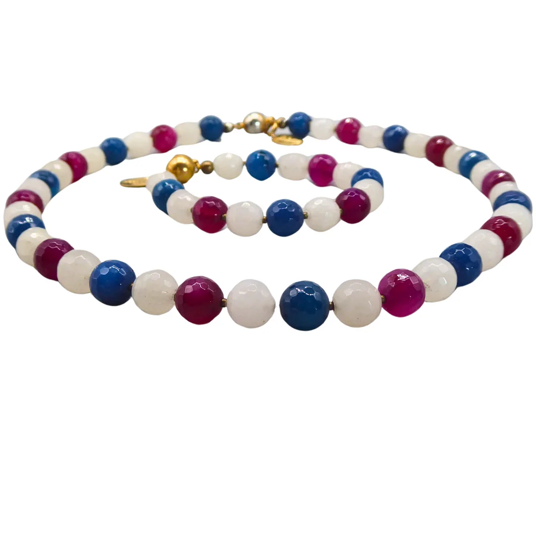 SCHMUCKSET VON DER DESIGNERIN ELISABETH NAEEM BESTEHEND AUS HALSKETTE UND ARMBAND. — Jewellery Suites — Auktionshaus Stuber's Hammerschlag