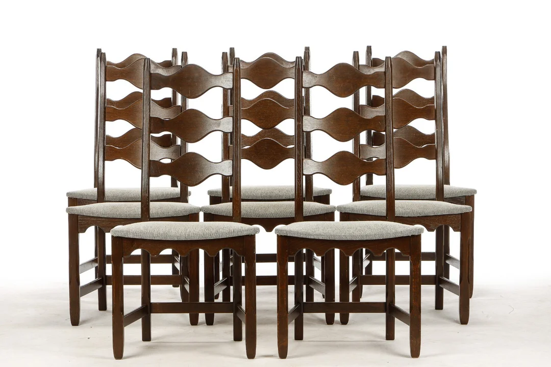 Henry Kjærnulf for Nyrup Møbelfabrik. Set of eight stained oak chairs, 1960s/70s (8) — Furniture/Chairs — Lauritz