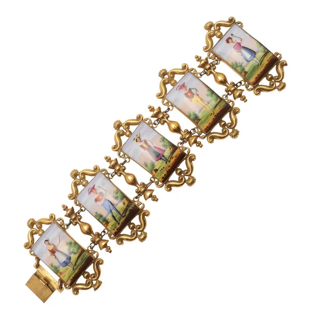 A CONTINENTAL ENAMEL AND GILT METAL BRACELET.