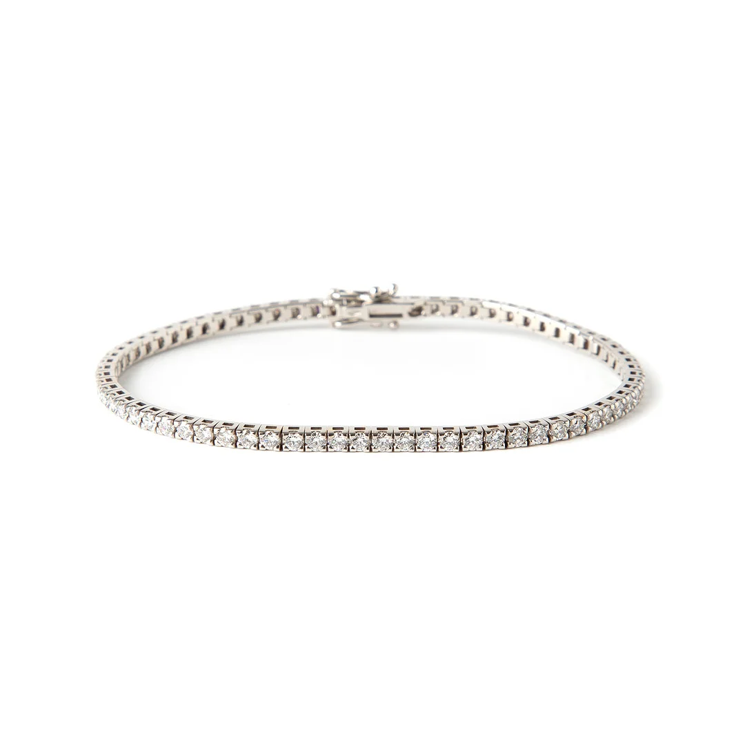 ARMBAND, 18K vitguld med briljantslipade diamanter totalt ca 3.56 ct. — Bracelets — Stockholms Auktionsverk Göteborg