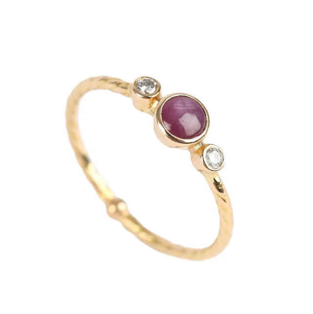 Natascha Trolle: A star ruby and diamond ring of 18k gold. Size 54.