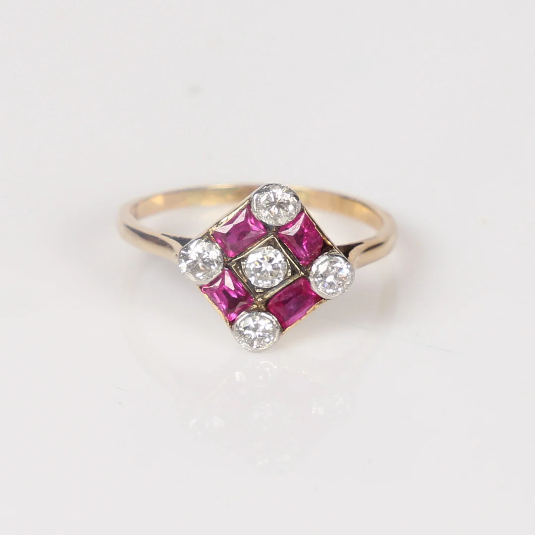 ART DECO DIAMOND AND SYNTHETIC RUBY CLUSTER RING. — Rings — Bishop & Miller