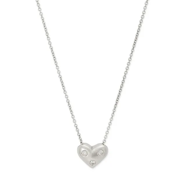An “Etoile Heart” necklace with a heart-shaped diamond pendant set with three brilliant-cut diamonds weighing a total of app. 0.06 ct, mounted in platinum. Weight app. 4.5 g. L. 41 cm.