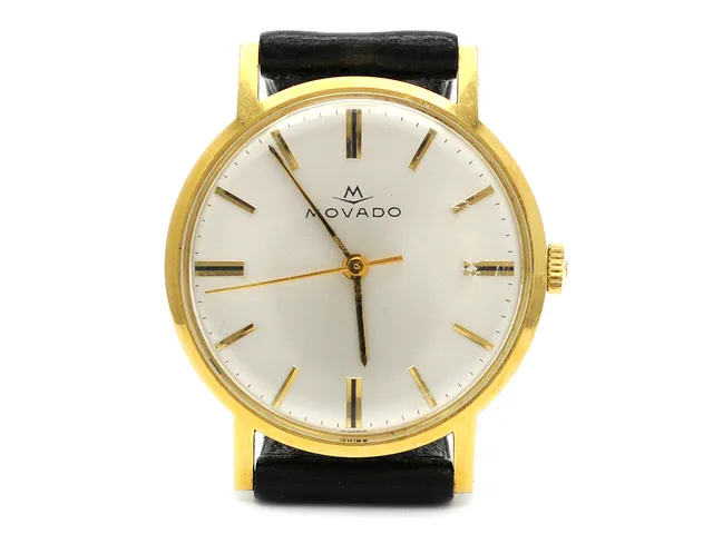 MOVADO, herrur, 34 mm, Cal 2542, Ref nr. 126214029, Boett nr. 779, 18K guld, manuell, plexiglas, skadad urtavla, gravyr, läderband, originalspänne, cert, maj 1970, box.