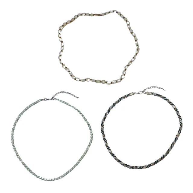 HALSKETTEN-SET AUS PERLEN UND PERLENSTRÄNGEN 3-TEILIG.