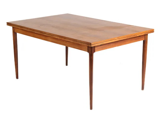 Niels O. Møller. Rosewood dining table with Dutch extension