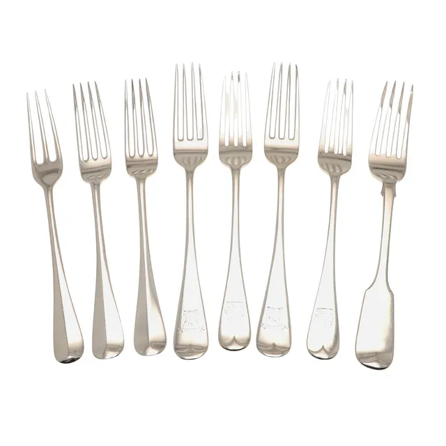 EIGHT SILVER TABLE FORKS.