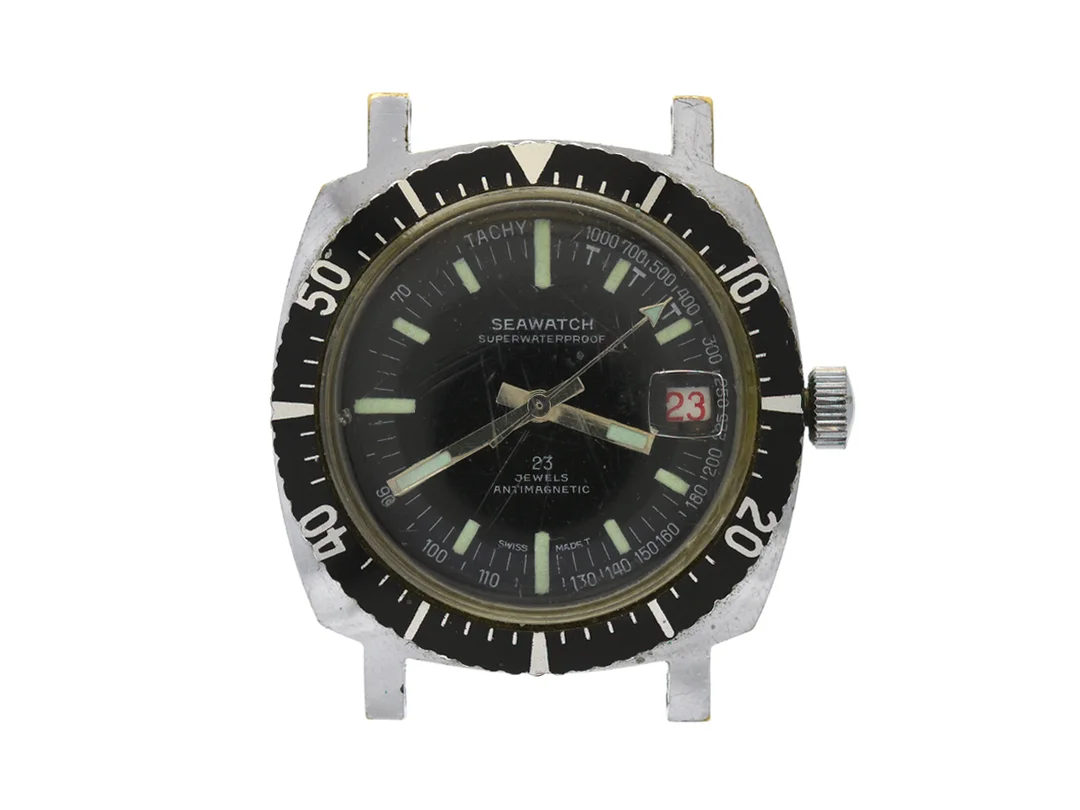 SEAWATCH, Antimagnetic, herrur, 36,5 mm, vitmetall, manuell, plexiglas, skadad urtavla, datum, ca 1970. — Klockor/Övriga klockor — Kaplans