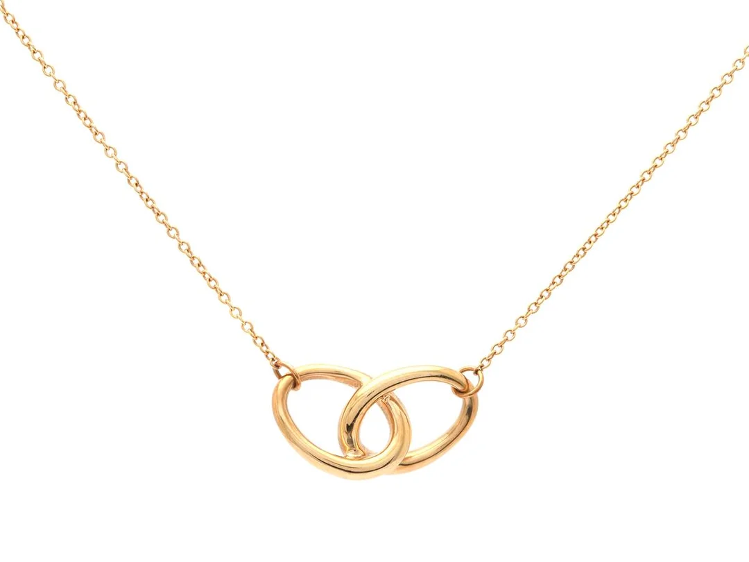TIFFANY & CO, collier, Interlocking Ovals, 18K guld, design Elsa Peretti, längd 40 cm, vikt 4,2 g, originalpåse. — Smycken/Collier — Kaplans