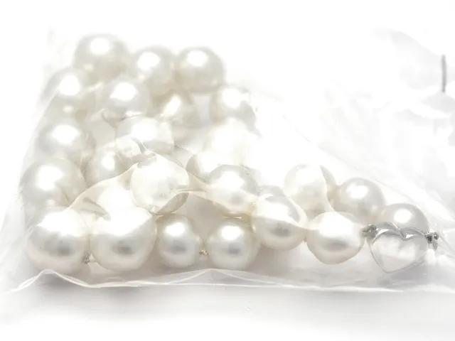 Pärlcollier, Southsea, odlade, 28xca.11,0-14,6mm, smärre ytfel, lås vitguld 18K, 43cm
