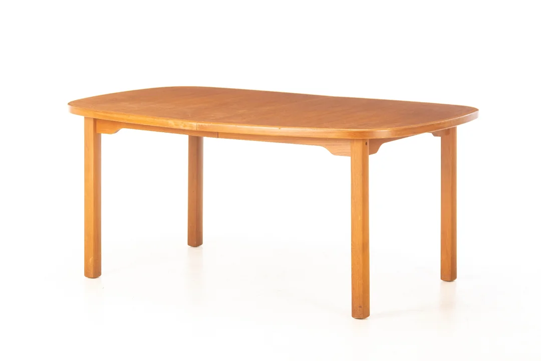 Danish furniture manufacturer. Teak dining table with extension. 1960s/70s. — Furniture/Dining tables, dining room furniture — Lauritz