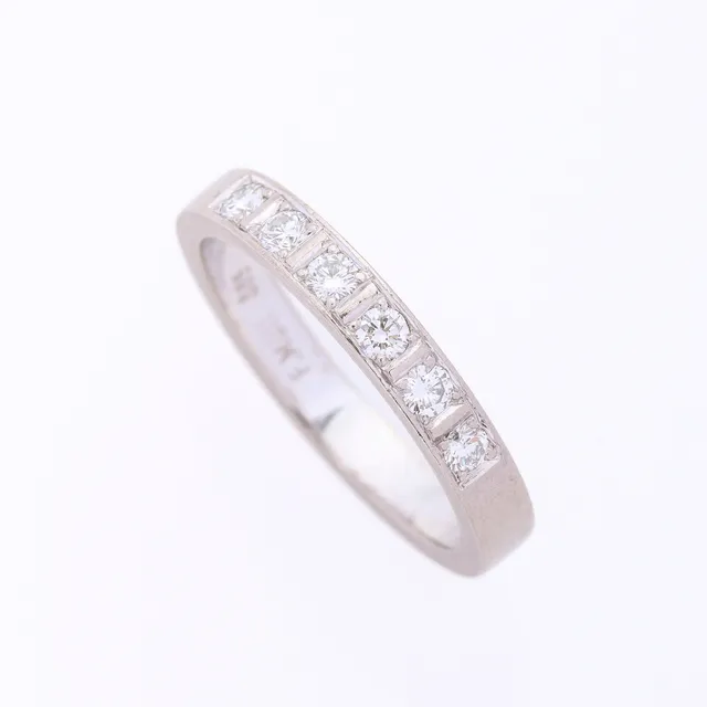 Müller`s Guldsmedje: A diamond eternity ring of 14k white gold, approx. 0.48 ct. TW/VS. Size 62.5.