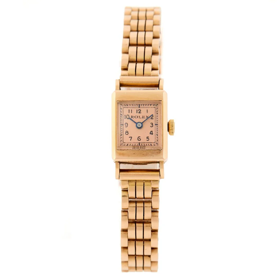 Wristwatch of 18k gold. Mechanical movement with manual winding. A. Michelsen bracelet of 14k gold. 12×16 mm. 1940s. — Clocks & watches/Wristwatches — Bruun Rasmussen