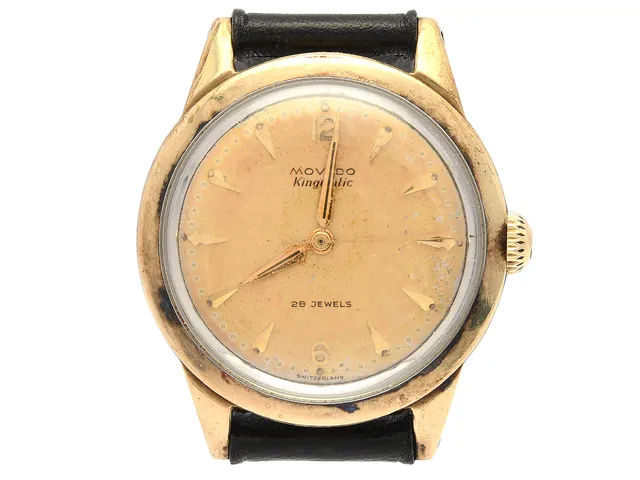 MOVADO, Kingsmatic, "Francois Borgel Case", Cal 431A, Verk nr. 9292, Boett nr. 448292 / 11182, herrur, 33 mm, guld på stål, automatisk, plexiglas, skadad urtavla, läderband, ca 1955.