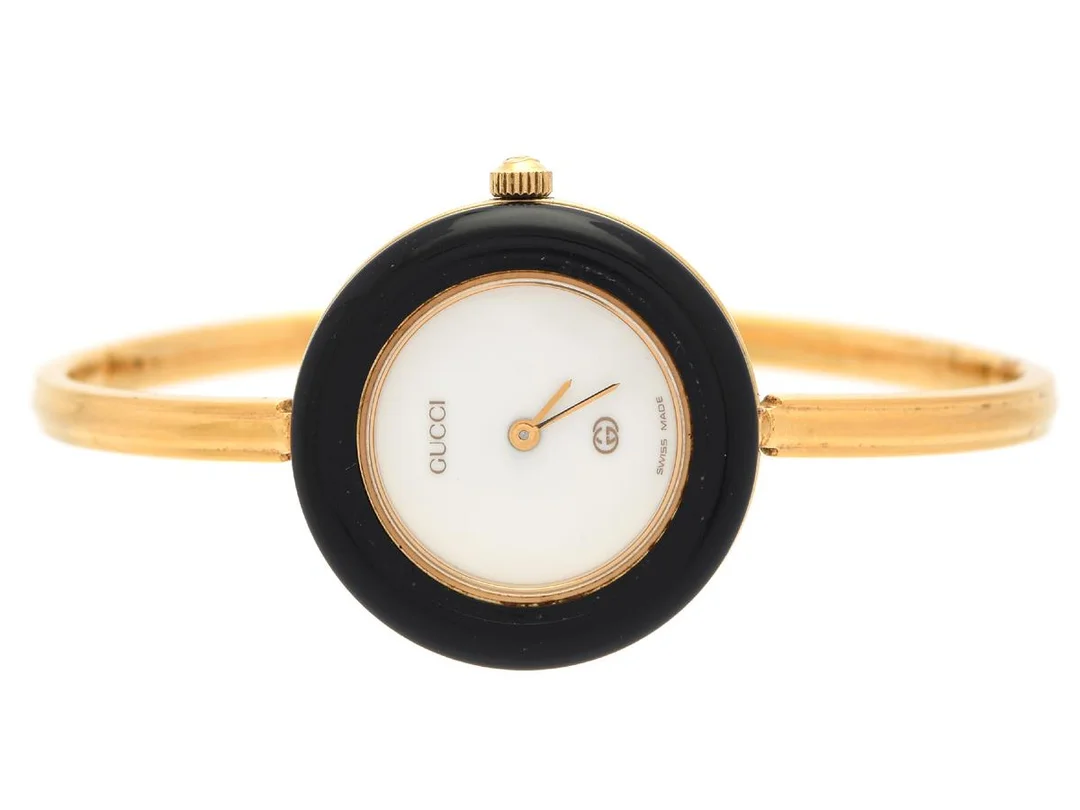 GUCCI, damur, 26 mm, Serie nr. 0623674, Boett nr. 11/12, doublé, quartz, mineralglas, 12 st. utbytbara ringar (3 st. skadade), integrerad originallänk, längd 160 mm, ca 1992, box. — Klockor/Gucci — Kaplans
