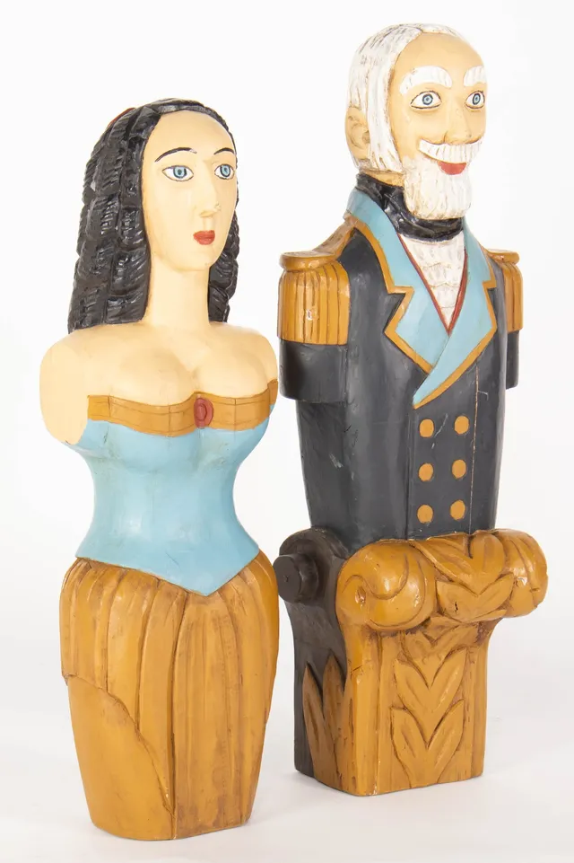 Pair of figureheads of carved and painted wood. 20th century. (2)