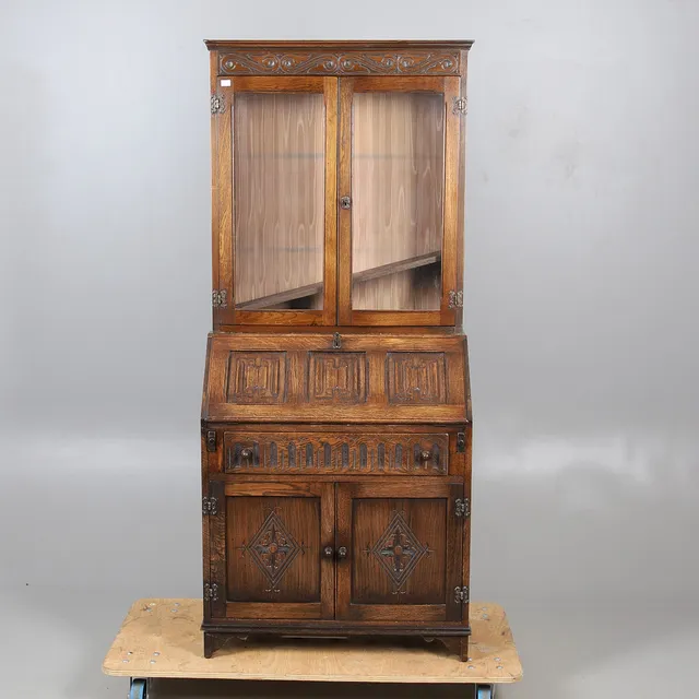 A TWENTIETH CENTURY OAK BUREAU BOOKCASE.